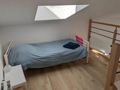 Un ou plusieurs lits dans un hébergement de l'établissement Penuel Tiny House