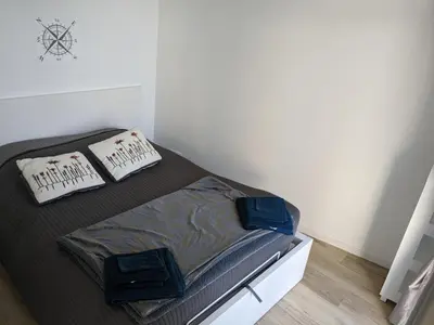 Un ou plusieurs lits dans un hébergement de l'établissement Penuel Tiny House