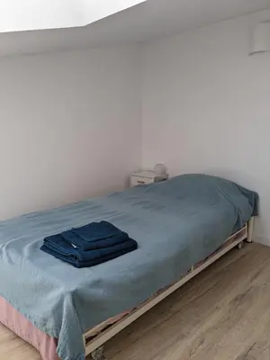 Un ou plusieurs lits dans un hébergement de l'établissement Penuel Tiny House