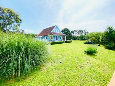 Jardin de l'établissement Norwegian Wooden House Near Carteret's Dunes