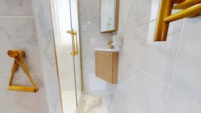 Salle de bains dans l'établissement Vue sur le Port de Caen Appartement Premium