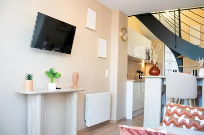 Cuisine ou kitchenette dans l'établissement Le Bleu de l'écume - Waterfront Suite