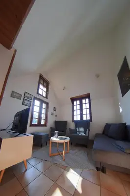 Coin salon dans l'établissement Modernes Landhaus mit großem Garten