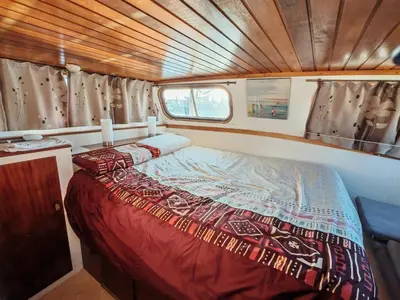 Un ou plusieurs lits dans un hébergement de l'établissement Bateau MAXENCE