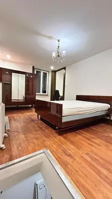 Un ou plusieurs lits dans un hébergement de l'établissement Studio duplex Meublé