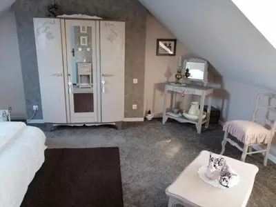 Coin salon dans l'établissement Au bonheur de Mona