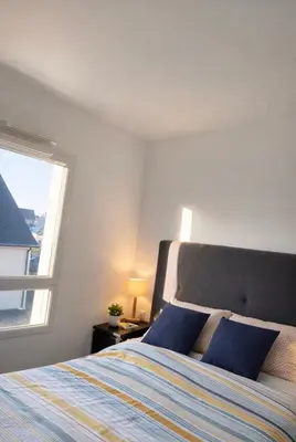 Un ou plusieurs lits dans un hébergement de l'établissement Villa moderne 5 minutes de la plage