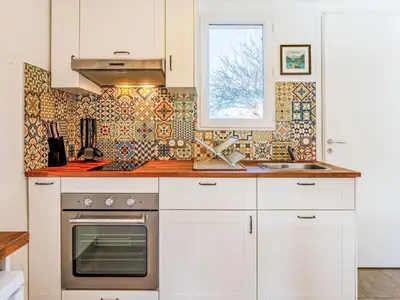 Cuisine ou kitchenette dans l'établissement Holiday Home Cabourg Cottage-4 by Interhome