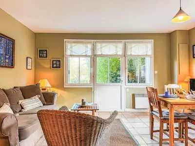 Coin salon dans l'établissement Apartment Gîte La Cormorandière by Interhome