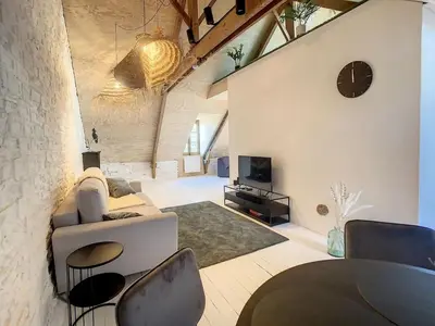 Télévision ou salle de divertissement dans l'établissement Appartement de charme, plein centre de Cancale