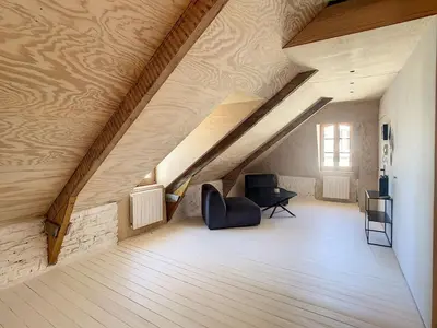 Coin salon dans l'établissement Appartement de charme, plein centre de Cancale