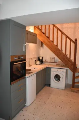 Cuisine ou kitchenette dans l'établissement Maison de pêcheur rénovée à deux pas du port