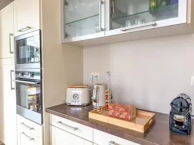 Cuisine ou kitchenette dans l'établissement L'Embellie - à 150m de la mer - Pétanque - Poêle à bois - Paisible