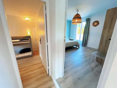 Un ou plusieurs lits dans un hébergement de l'établissement La brise au pied de la plage