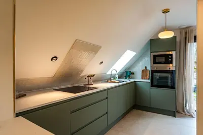 Cuisine ou kitchenette dans l'établissement Tulipe