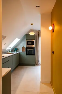 Cuisine ou kitchenette dans l'établissement Tulipe