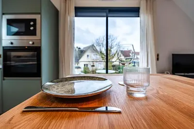 Cuisine ou kitchenette dans l'établissement Tulipe