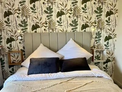 Un ou plusieurs lits dans un hébergement de l'établissement Eco Hôtel du Domaine de Ouézy