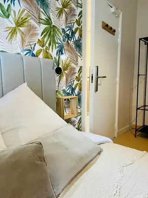 Un ou plusieurs lits dans un hébergement de l'établissement Eco Hôtel du Domaine de Ouézy