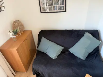 Coin salon dans l'établissement Appartement duplex VARAVILLE
