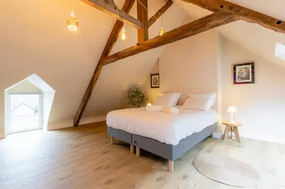 Un ou plusieurs lits dans un hébergement de l'établissement Maison de Pêcheur à Cancale, Jardin et Sauna - Le Jardin Suspendu