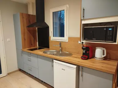 Cuisine ou kitchenette dans l'établissement Le Célina