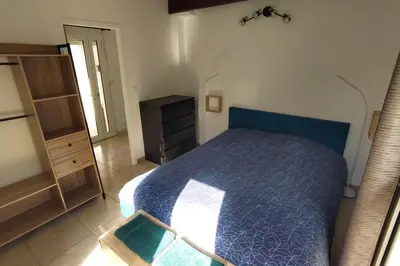 Un ou plusieurs lits dans un hébergement de l'établissement Maison lumineuse avec terrasse et jardin - Caen
