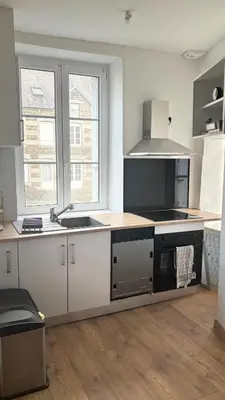 Cuisine ou kitchenette dans l'établissement Beauchamps