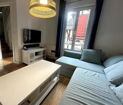 Télévision ou salle de divertissement dans l'établissement La Toccata maison de charme au coeur de l'éventail de Cabourg