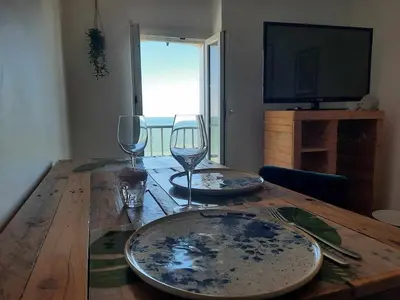 Télévision ou salle de divertissement dans l'établissement Sea view