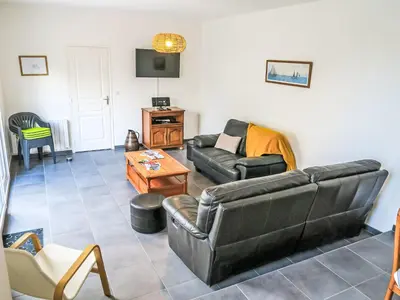 Coin salon dans l'établissement Holiday Home Mahionias's cottage by Interhome