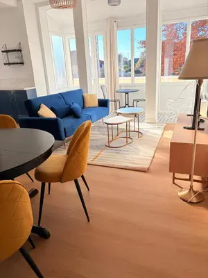 Coin salon dans l'établissement Face au port - Appart lumineux avec véranda