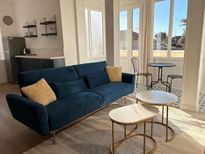 Coin salon dans l'établissement Face au port - Appart lumineux avec véranda