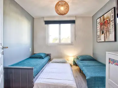 Un ou plusieurs lits dans un hébergement de l'établissement Appartement au cœur de la station, vue mer - 5 pers. - FR-1-788-101