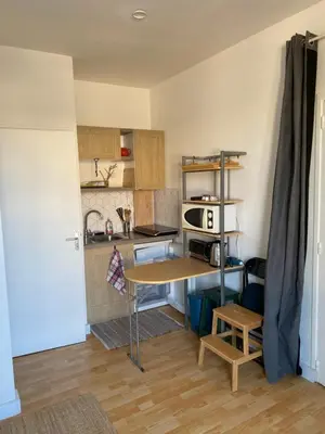 Cuisine ou kitchenette dans l'établissement La petite aubaine