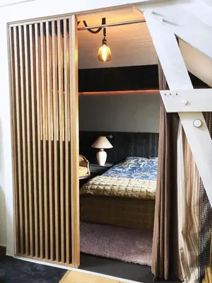 Un ou plusieurs lits dans un hébergement de l'établissement Maison de ville à Luc sur Mer