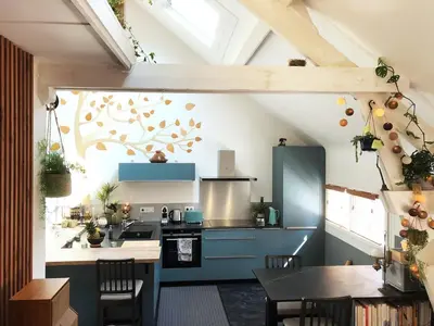 Cuisine ou kitchenette dans l'établissement Maison de ville à Luc sur Mer