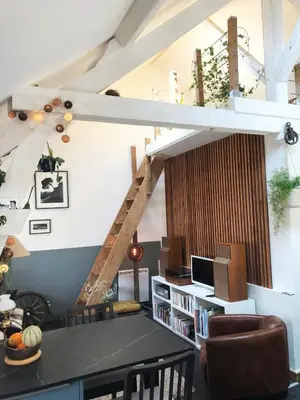 Coin salon dans l'établissement Maison de ville à Luc sur Mer