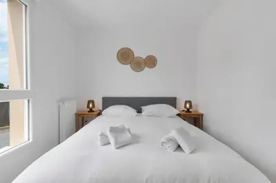 Un ou plusieurs lits dans un hébergement de l'établissement Escapade & Confort à Cabourg 4 pers