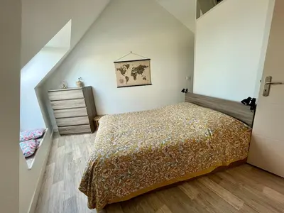 Un ou plusieurs lits dans un hébergement de l'établissement L'Erable - Maison vue mer