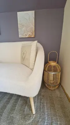Coin salon dans l'établissement Gîte le petit Hérils
