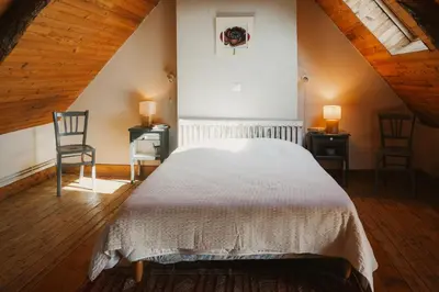 Un ou plusieurs lits dans un hébergement de l'établissement Maison de Campagne