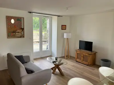 Télévision ou salle de divertissement dans l'établissement Gite au coeur de la Baie du Mont Saint-Michel