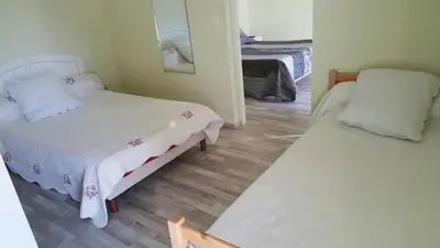 Un ou plusieurs lits dans un hébergement de l'établissement Hotel de la Gare