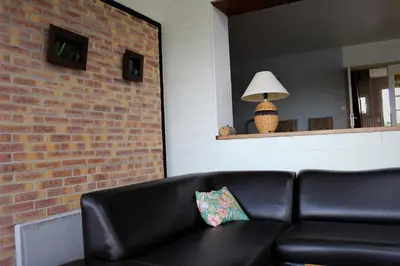 Coin salon dans l'établissement Gîtes Bellevue et Mascaret