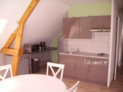 Cuisine ou kitchenette dans l'établissement La Grimodière Gîte