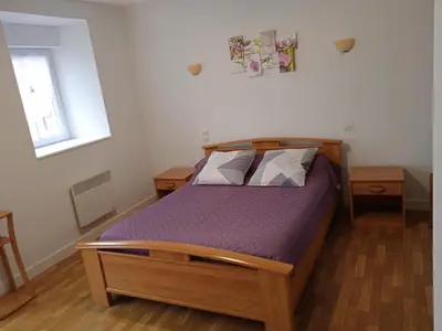 Un ou plusieurs lits dans un hébergement de l'établissement Chambres d'hôtes Le Petit Angle