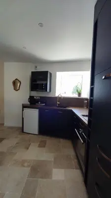 Cuisine ou kitchenette dans l'établissement Le Clos Saint-Gilles