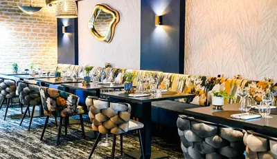 Restaurant ou autre lieu de restauration dans l'établissement La glycine hotel, spa et bien-être