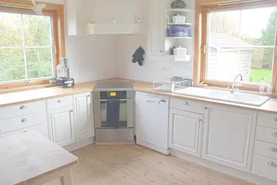 Cuisine ou kitchenette dans l'établissement Between the dunes and the sea